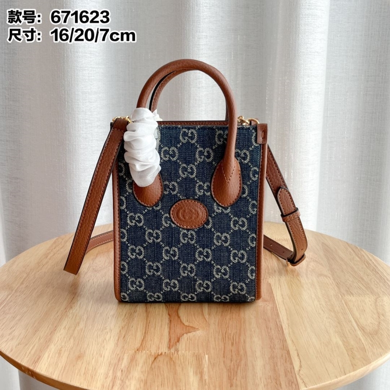 G*u*i top handle bags